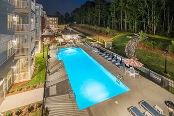 Outdoor saltwater pool with poolside lounging